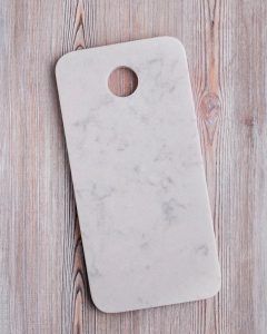 Tabla de mármol blanco rectangular con agujero grande para colgar